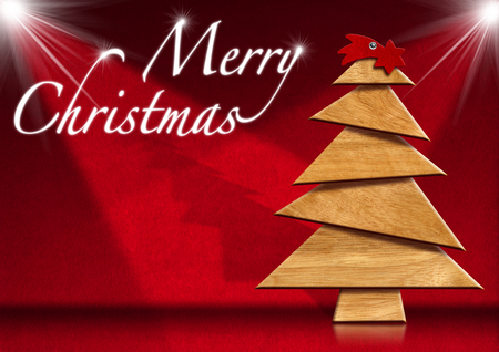 Wooden Christmas tree and red comet on red velvet の写真素材