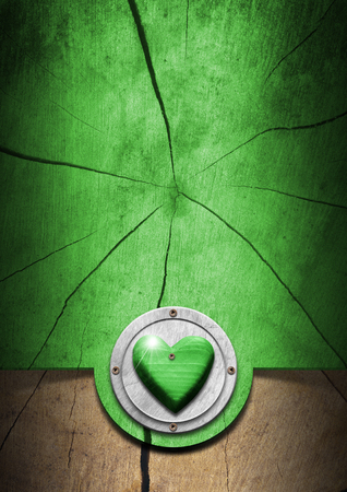 Wood eco with green heart on a trunk section, concept of ecology
の写真素材