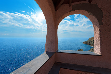 Church of Madonnina della Punta with the Ligurian sea and the cliffs  Near Bonassola, ancient village, La Spezia, Italyの写真素材
