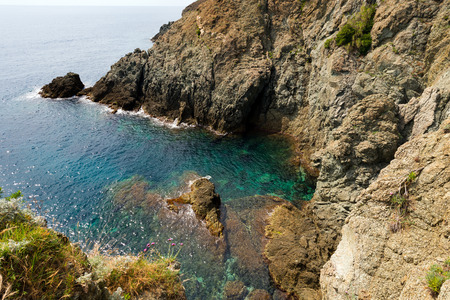 Small bay of the sea with high cliffs at Bonassola, ancient village in Ligurian coast in the east, La Spezia, Italyの写真素材