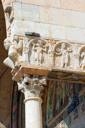 Detail of ancient porch of the Basilica of San Zeno (X-XI century) in Verona Italy. Is considered one of the masterpieces of Romanesque architecture in Italyの写真素材