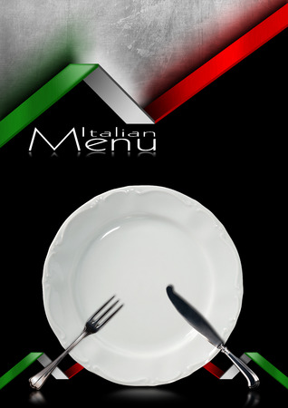 Black and metallic background with italian flags, empty white plate with silver cutlery, fork and knife. Template for a Italian food menuの写真素材