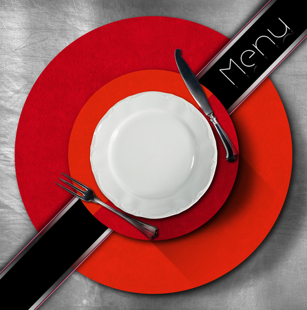 Restaurant menu with empty plate and cutleryの写真素材