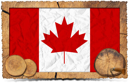 Rectangular wooden frame with flag of Canada and sections of tree trunk isolated on white backgroundの写真素材