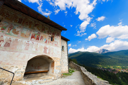 Ancient mountain church of Santo Stefano St. Stephen in Carisolo, Val Rendena, Trento, Italyの写真素材