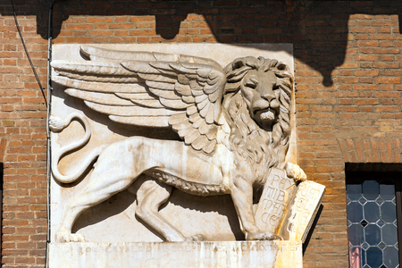 The winged lion of St Mark, symbol of the Venetian Republic, in Piazza dei Signori, の写真素材