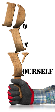 Hand with work glove holding a wooden sign with text Diy Do it yourself. Isolated on white backgroundの写真素材
