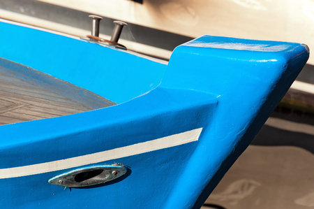 Detail of a prow of a blue and white rowing boat. Liguria, Italyの写真素材