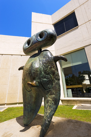 BARCELONA, SPAIN - JUNE 11, 2014: Personnage (Personage) - 1970 of Joan Miro (1893-1983). The bronze statue is located at the entrance to the Museum and Foundation Joan Miro in Barcelonaのeditorial素材