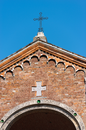 Detail of the facade of the famous and ancient basilica of Saint Ambrose (Sant'Ambrogio 379-1099) in Milano, Lombardia, Italyの写真素材