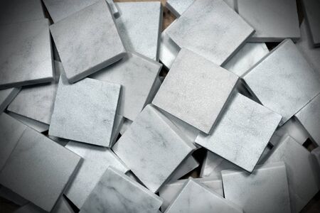 Many small square tiles of white Carrara marble. Tuscany, Italyの写真素材