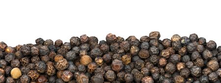 Peppercorns isolated on white background - Macro photography