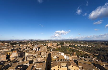 Aerial view of the ancient town of Siena from the Torre del Mangia (Tower of Mangia). Toscana...