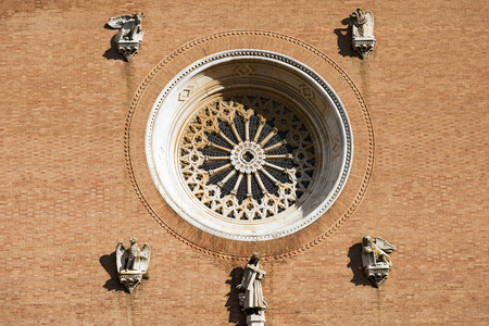 Detail of the Basilica of San Francesco (XIII century) with the rose window and the four symbols of the evangelists. Siena. Toscana (Tuscany), Italy, Europeの写真素材