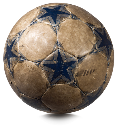 Detail of a old blue and brown soccer ball isolated on white backgroundの写真素材