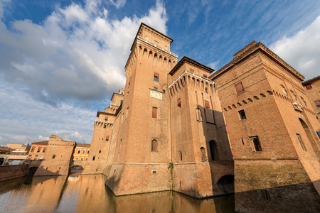 Estense Castle or Castle of San Michele (1385) is a moated medieval castle in the center of Ferrara, Emilia-Romagna, northern Italy. It consists of a large block with four corner towersの写真素材