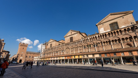 FERRARA, EMILIA-ROMAGNA, ITALY, FEBRUARY 14, 2018: St. George Cathedral (Cattedrale di San Giorgio, 1135) and the Tower of Victory (Torre della Vittoria) in downtown of Ferraraのeditorial素材