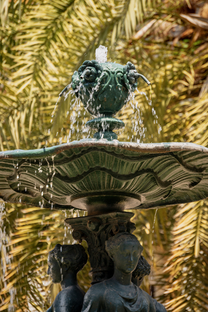 Detail of the bronze fountain of the Three Graces in Placa Reial (Plaza Real or Royal Plaza), square in the Barri Gotic of Barcelona, Catalonia, Spainの写真素材