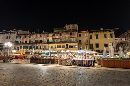 Piazza delle Erbe at night, is the oldest square in Verona UNESCO heritage site, Veneto, Italy, Europeのeditorial素材