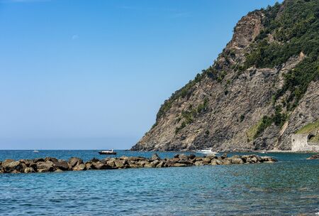 Mediterranean Sea with cliff and coastline near the small Village of Framura. La Spezia, Liguria,...