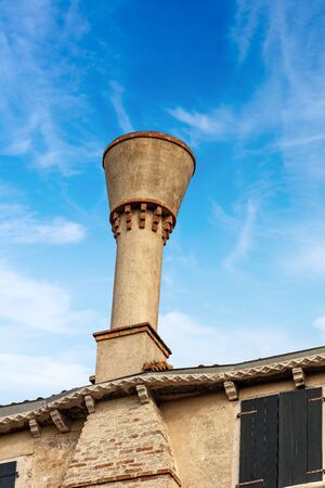Venice, Ancient typical chimney on the roof of a house, UNESCO world heritage site, Veneto, Italy, Europeの写真素材