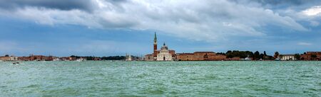 Venice, Venetian lagoon with the Basilica of San Giorgio Maggiore in Renaissance style by the architect Andrea Palladio. UNESCO world heritage site, Veneto, Italy, Europeの写真素材
