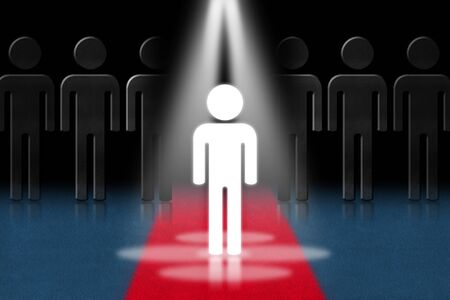 3D illustration of a man on a red carpet under the lights of the stage. Concept of standing out from the crowdの写真素材