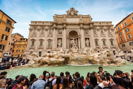Trevi fountain (Fontana di Trevi 1732-1762) and Palazzo Poli, in Rome crowded with tourists. UNESCO world heritage site, Lazio, Italy, Europeのeditorial素材