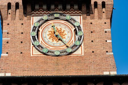 Castello Sforzesco. Extreme close up of the clock tower of the Sforza Castle (XV century), Milan,...