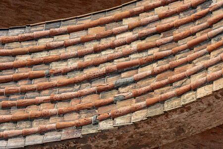 Pantiles. Closeup of a roof with tiles made from clay (Coppo, Italian), Metropolitan Cathedral of San Pietro, Bologna, Emilia-Romagna, Italy, Europeの写真素材