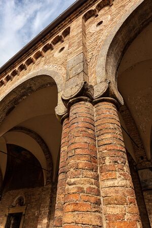 Ancient brick columns of the Basilica of Santo Stefano also known by the name of the Seven Churches in early Christian, Romanesque and Gothic style. Bologna, Emilia-Romagna, Italy, Europeの写真素材