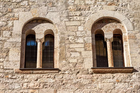 Trento downtown. Palazzo Pretorio or Palazzo Vescovile (Praetorian Palace), Ancient medieval palace with two mullioned windows (Bifora). Trentino-Alto Adige, Italy, Europeのeditorial素材