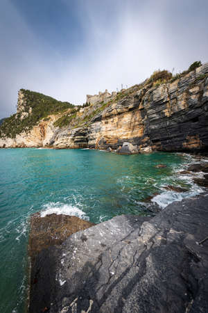 Doria Castle (1164-XIX century) of Porto Venere or Portovenere town (UNESCO world heritage site) on the rocky coastline along the Mediterranean Sea. La Spezia, Liguria, Italy, Europeのeditorial素材