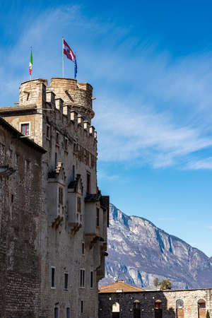 Castello del Buonconsiglio or Castelvecchio with the tower (Torre di Augusto (XIII-XVIII century), Medieval castle in Trento city with the alps in the background. Trentino Alto Adige, Italy, Europeのeditorial素材