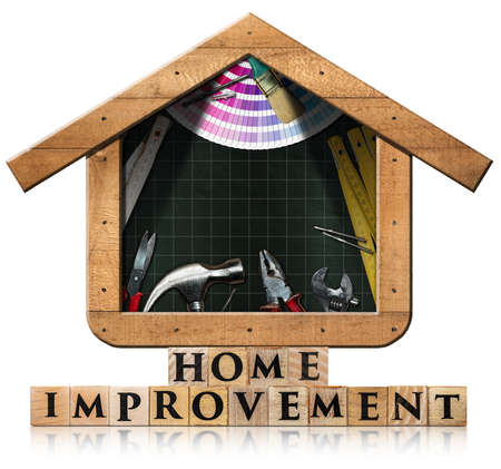 Text Home Improvement, made of wooden blocks and a House-shaped blackboard with wooden frame, DIY work tools and copy space. Isolated on white backgroundの写真素材