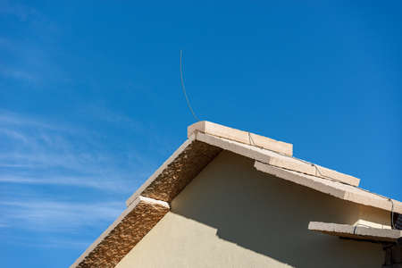 Closeup of a traditional stone roof with a lightning rod of a house on the Lessinia Plateau, Alps, Verona Province, Veneto, Italy, Europe.の写真素材