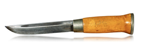 Closeup of an old hunting knife made in Norway isolated on white background with reflections.