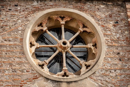 Close-up of the rose window of the Church of San Zeno in Oratorio in Romanesqueの写真素材