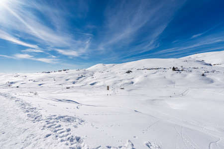 Malga San Giorgio Ski Resort in winter with snow. Altopiano della Lessinia (Lessinia Plateau),...