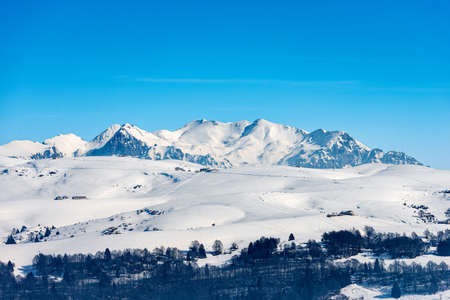 Lessinia High Plateau (Altopiano della Lessinia) and the Mountain range of the Monte Carega in winter with snow, also called the small Dolomites. Veneto and Trentino Alto Adige, Italy, Europe.の写真素材