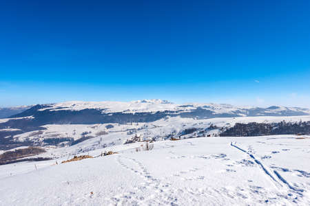 Lessinia High Plateau (Altopiano della Lessinia) and the Mountain range of the Monte Carega in winter with snow, also called the small Dolomites. Veneto and Trentino Alto Adige, Italy, Europe.の写真素材