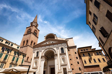 Facade and bell tower of the Basilica and Cathedral of SantâAndrea (Saint Andrew) in Renaissance, Baroque and Gothic style (1472-1732) in Mantua, Piazza Andrea Mantegna, Lombardy, Italy, Europeの写真素材