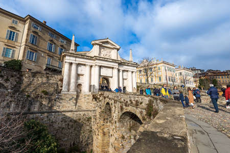 Ancient Gate of San Giacomo (St. James), 1592, and the surrounding walls (1561). Bergamo upper town with the bas relief of the Winged Lion of Saint Mark, Lombardy, Italy.のeditorial素材