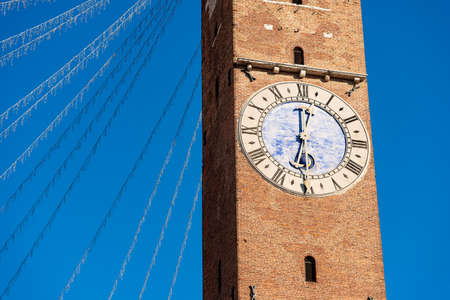 Civic Tower or Clock Tower in Vicenza downtown, called Torre Bissara or Torre di Piazza, XII...