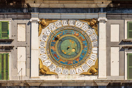 Brescia downtown. Clock and bell tower in Renaissance style, 1540-1550, in Loggia town square...