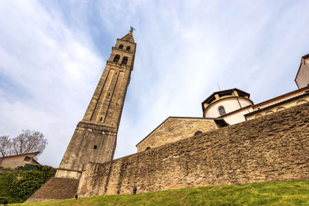 Cathedral of the small town of Oderzo (Duomo di San Giovanni Battista, Saint John Baptist) with the leaning bell tower, XI century - 1535. Treviso province, Veneto, Italy, Europe.の写真素材