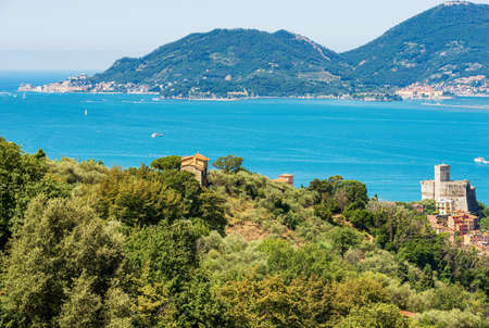 Elevated view of the Gulf of La Spezia, Liguria, Italy, Europe. Lerici town with the ancient castle (1152-1555), and Portovenere or Porto Venere, UNESCO world heritage site.のeditorial素材