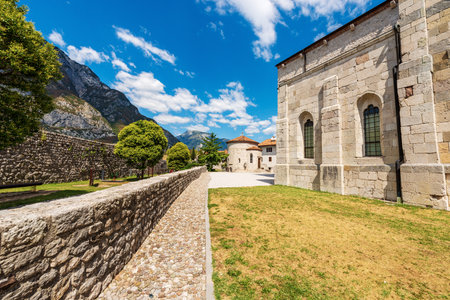 Venzone, Baptistery or Chapel of San Michele, with the crypt of the mummies and the Cathedral, Church of St. Andrew the Apostle, 1308. Udine province, Friuli-Venezia Giulia, Italy, Europe.の写真素材