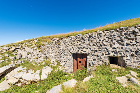 Bunker or fortress of the second world war, Trekking footpath to the Mountain Peak of Osternig or Oisternig, Carnic Alps, Italy-Austria border, Europe. Tarvisio, Udine province, Friuli Venezia Giulia.の写真素材