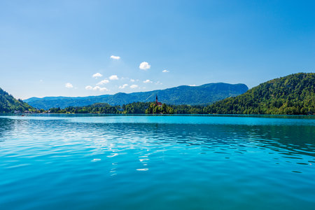 Lake Bled and Bled Island with the ancient Church of the Mother of God on the Lake (Cerkev Matere bozje na jezeru), XVII century. Bled town, Gorenjska, Triglav National Park, Alps, Slovenia, Europe.の写真素材